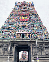 Ancient Hindu temple with beautiful God sculptures in the tower of Kapaleeshwarar temple in Tamil...