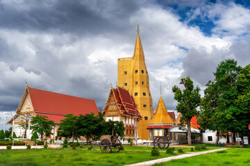 Fototapeta na wymiar Golden pagoda at Wat Bung Khilek, Khemarat District, Ubon Ratchathani Province, Thailand.