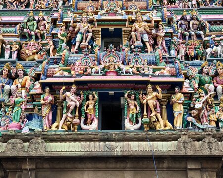 Statues of Hindu God kept in the gopuram of ancient Kapaleeshwarar temple in Tamil nadu. Hindu temple tower with God sculptures in the top.