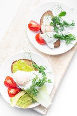 Top view of healthy breakfast with poached eggs