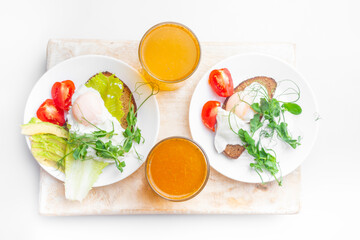 Top view of healthy breakfast with poached eggs