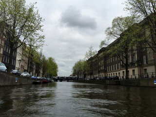 Fototapeta premium landscape of canals of Amsterdam in the country, North Holland, Netherlands