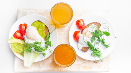 Top view of healthy breakfast with poached eggs