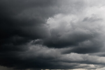 Obraz premium Huge black clouds in the sky before the rain