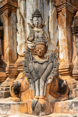 Ancient guardian statue at pagoda field in Sagar