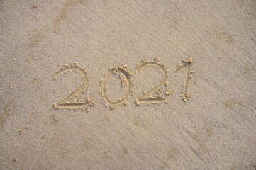 writing in the sand year 2021 we go on vacation again