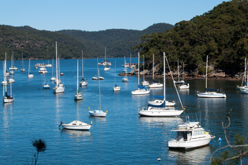 Fototapeta na wymiar Brooklyn Australia, view across river with moored boats to nature reserve