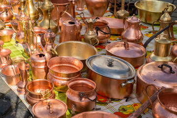 Fototapeta na wymiar copper pots at the gypsy fair