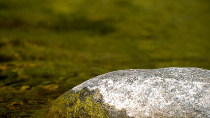 Stone in a river stream