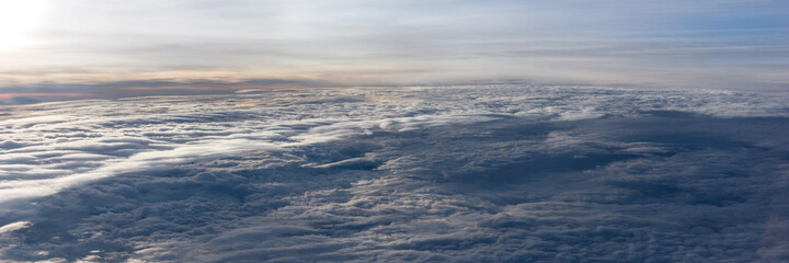 Over the clouds. Fantastic panoramic background with clouds