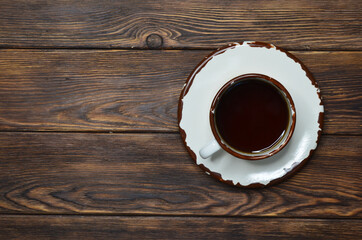 Cup of fresh black espresso coffee top view copy space text