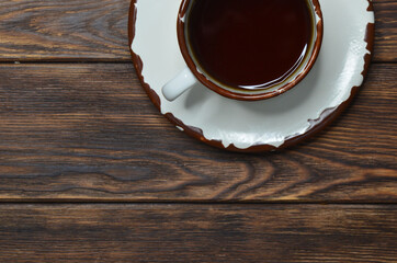 Cup of fresh black espresso coffee top view copy space text