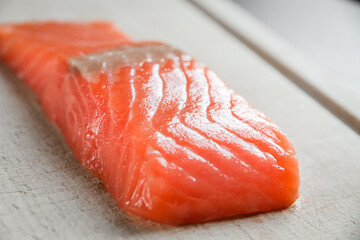 Salmon steak on a cutting board