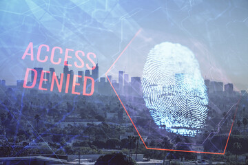 Double exposure of finger print hologram and cityscape background. Concept of personal security.