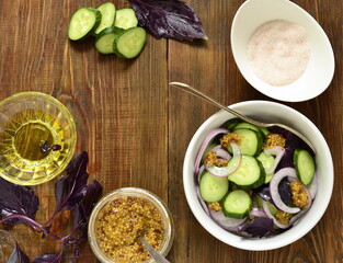 Cucumber Salad with Pickled Vinegar and French Mustard, top view, copy space