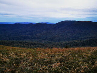 Bieszczady Poland. Autumn colors of the mountains. Cloudy sky. Active weekend.