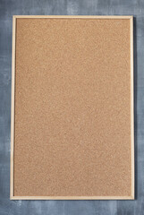 cork board at concrete painted wall background