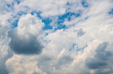 Grey and white clouds in the sky (background)