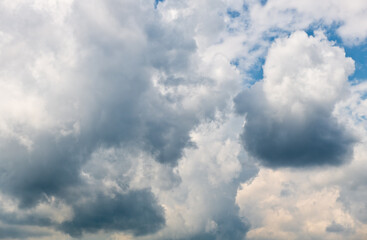 Grey and white clouds in the sky (background)