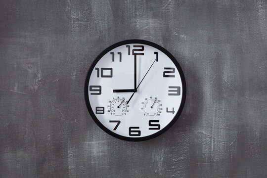 clock at wall background surface