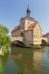 Fototapeta premium Close up of the Old Town Hall with the Upper Bridge built over the Regnitz River