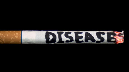 A cigarette smolders with the word 