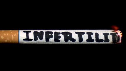 A cigarette smolders with the word 