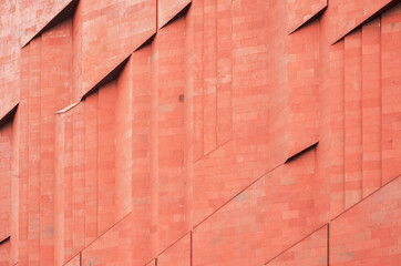 Texture of terracotta brick wall with parallel pattern
