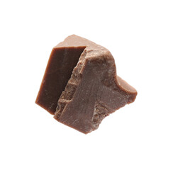 Piece of delicious milk chocolate isolated on white