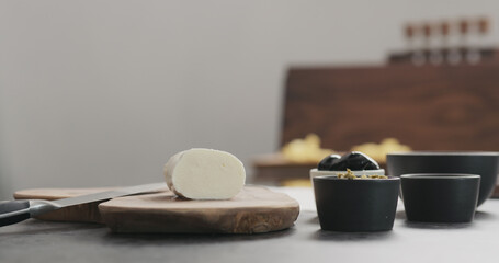Obraz na płótnie Canvas mozzarella cheese on the wooden cutting board