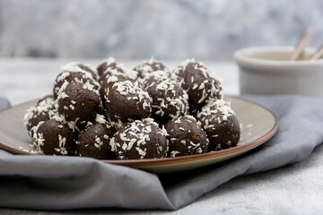 Healthy energy balls with rolled oats, nuts and dried fruits. Vegan bites.