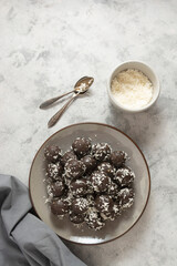 Healthy energy balls with rolled oats, nuts and dried fruits. Vegan bites. Top view