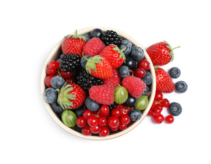Mix of different fresh berries in bowl on white background, top view