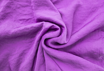 Fototapeta na wymiar Purple banner. The texture of the silky fabric in soft folds. Glamorous background for blogger