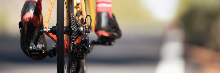 Racing - bike detail on gear wheels and feet © pavel1964