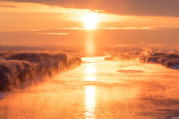 Fototapeta na wymiar Severe winter morning with sun pillar