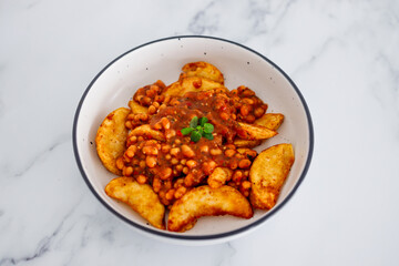 plant-based food, potato wedges with baked beans