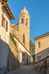 Fototapeta na wymiar Church of Corpus Domini in the morning streets of Montalcino in Italy