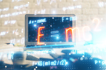 Desktop computer background and formula hologram writing. Double exposure. Education concept.