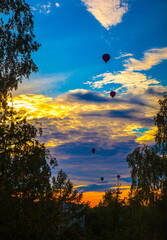 Hot air balloons in the evening sky