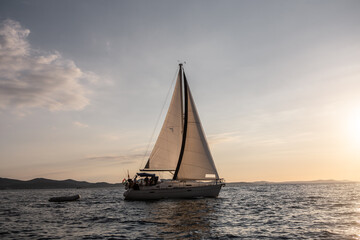 Obraz na płótnie Canvas A vintage sailboat at the coast of Zadar, in Croatia.