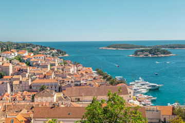 The old harbour at Hvar island, at the coast of Croatia, on a sunny day, summer time.