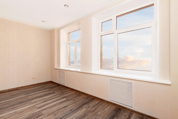 White empty room with two windows and wooden floor. Loft interior mock up. 3d render home blank space.