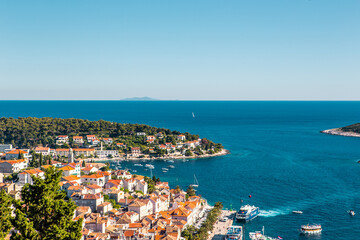Naklejka na ściany i meble The old harbour at Hvar island, at the coast of Croatia, on a sunny day, summer time.