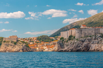 Fototapeta na wymiar The Dubrovnik old town and fortress by the sea, shot from the sea angle.