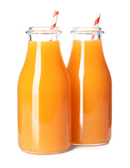 Fresh carrot juice in glass bottles on white background