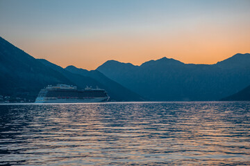 Sunset view of Kotor Bay in Montenegro,  with mountains and sea.