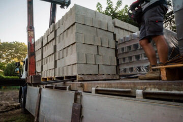 delivery of concrete blocks to a construction site