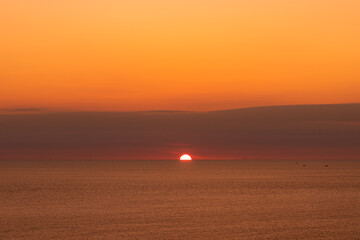 Landscape of Sunset ocean sea horizon sky clouds.
