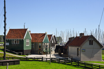 Old Dutch fisherman's cottages with picturesque facades in the traditional colors.